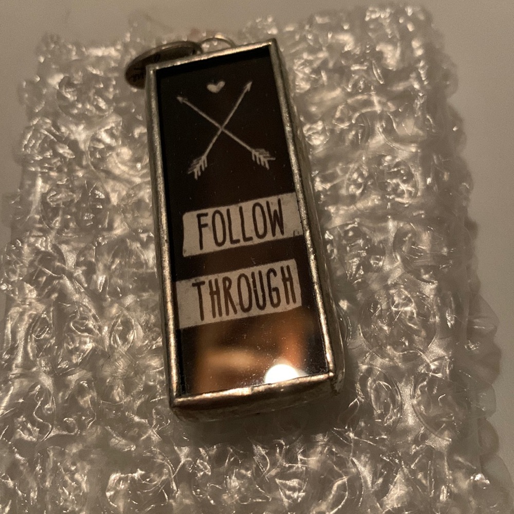Jewel Kade/Thirty-one pendant Gold arrow/Follow Through opposite side. No chain.